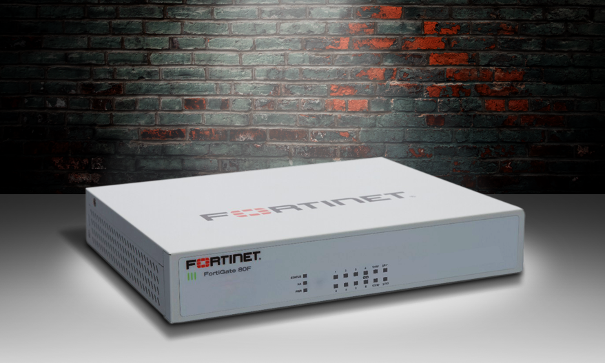 Fortinet FG-80F firewall appliance spotlit on a stage.